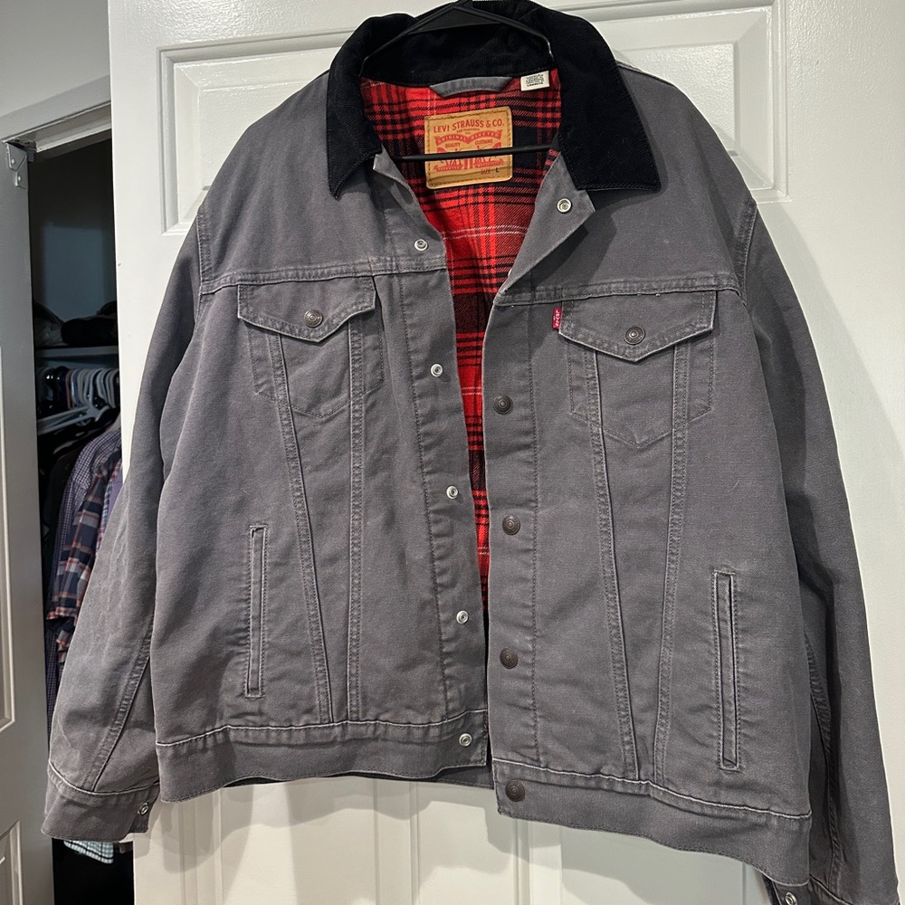 Men’s size L Levi’s grey trucker jacket with red lining